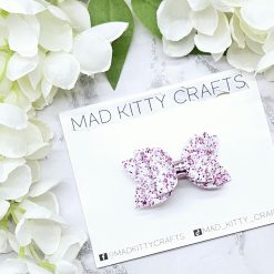 Pink/white glitter bow