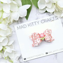 Coral/white flower bow
