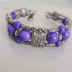 Purple beaded silver metal memory wire bracelet
