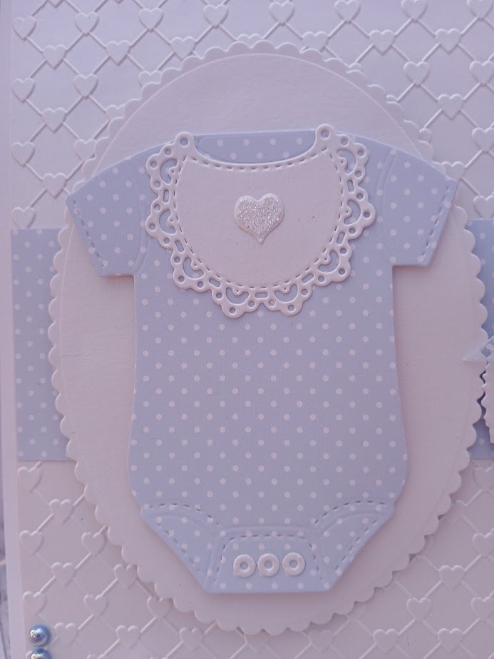 Luxury Handmade Baby Boy - Congratulations on your Baby Boy - White & blue onesie with embossed heart background Luxury Handmade Baby Boy - Congratulations on your Baby Boy - White & blue onesie with embossed heart background