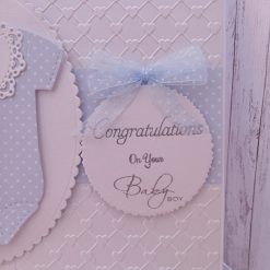 Luxury Handmade Baby Boy - Congratulations on your Baby Boy - White & blue onesie with embossed heart background 1 Luxury Handmade Baby Boy - Congratulations on your Baby Boy - White & blue onesie with embossed heart background 1