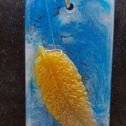 Feather on a Blue pendant
