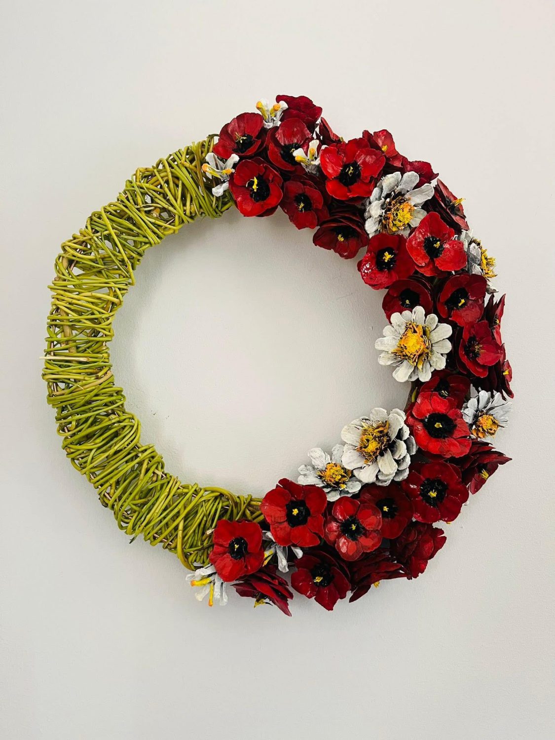 Willow wreath with pinecone poppies and daisies Willow wreath with pinecone poppies and daisies