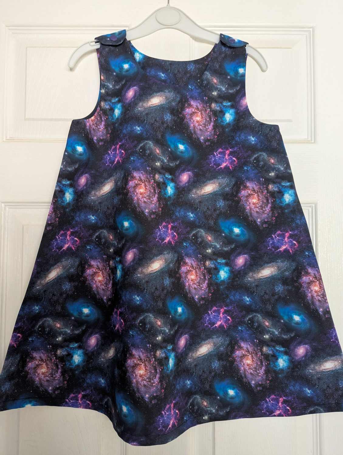 PXL_20250517_141419685 Girls pinafore dress - space 3