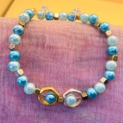Handcrafted Turquoise and Light Blue beaded bracelet.