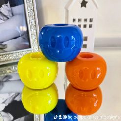 Smiley face candle holder