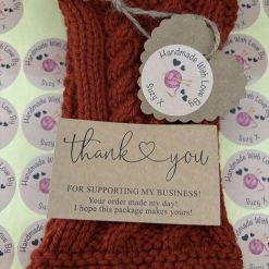 Hand knitted hand warmers