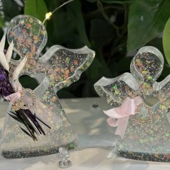 Handmade Pair of freestanding white glitter resin angels with flowers, ribbon & heart 💙