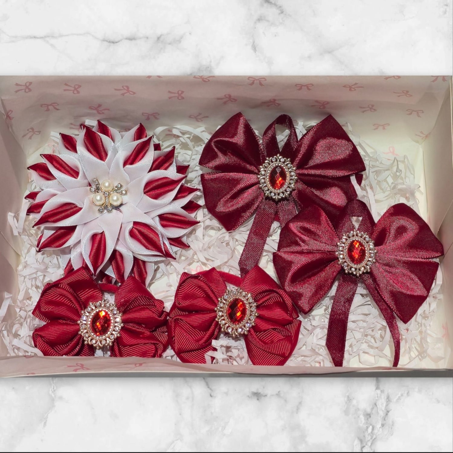 Gift box with hairbows collection in red colors. Gift box with hairbows collection in red colors.