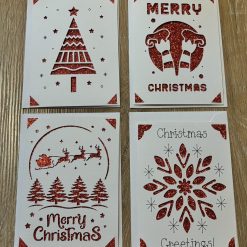 A Set of 4 Handmade Christmas Cards – Precision Cut Glitter Designs