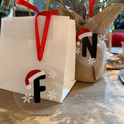 A Personalised Acrylic Christmas Bauble with Initial and Santa Hat 🎄