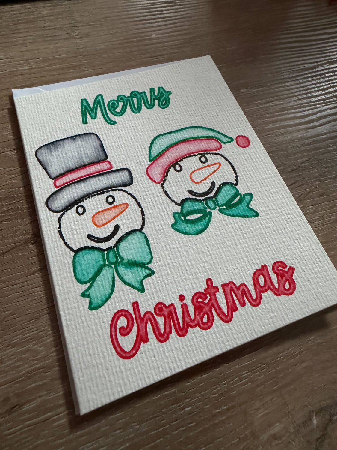 Hand-Painted Snowmen Christmas Card – Merry Christmas Design Hand-Painted Snowmen Christmas Card – Merry Christmas Design
