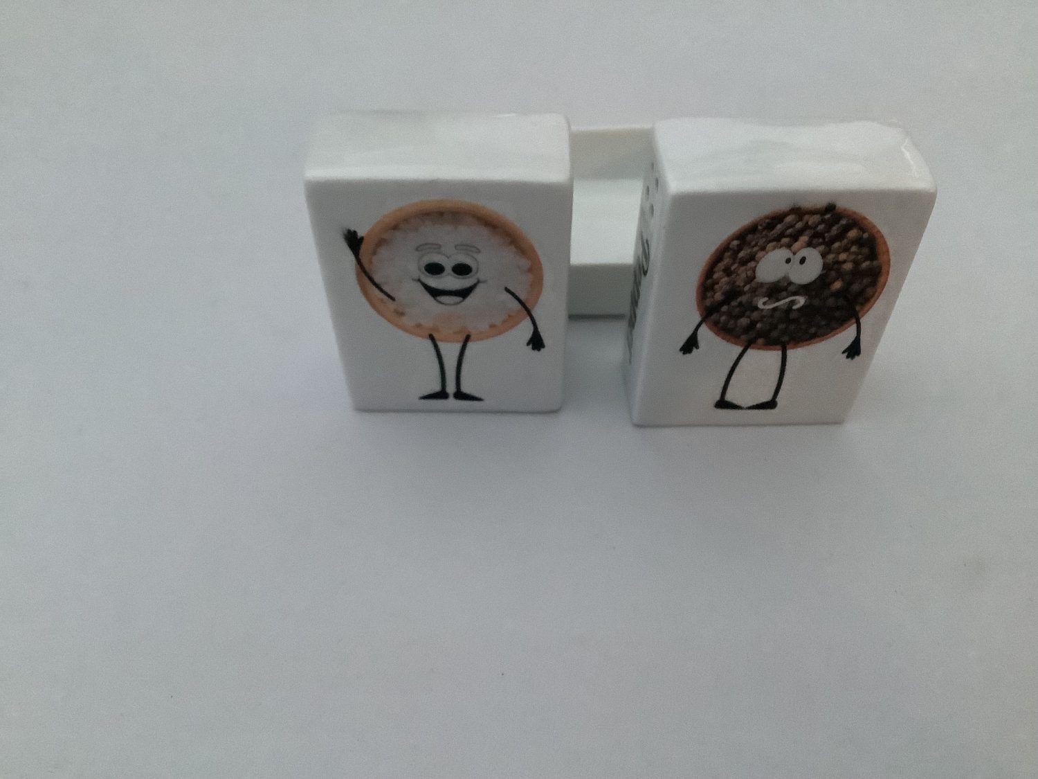IMG_6803 Decoupaged salt and pepper pot with a salt and pepper design 1