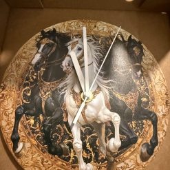 Vintage trio horse metal clock