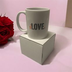White cup with love design