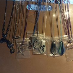 Glass and various types of necklaces