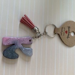 Letter k keyring with a tassel