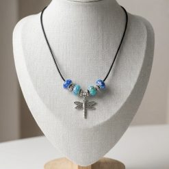 Necklace With Blue Beads and a Small Silver Dragonfly Charm