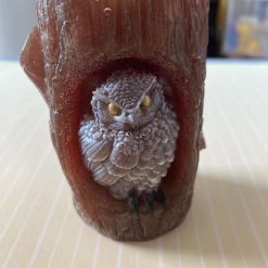 Beautiful handmade resin owl chilling in a tree