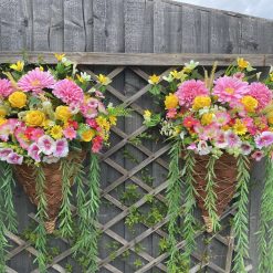Wall hanging artificial baskets pinks / yellows