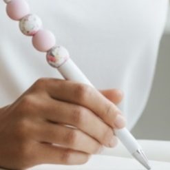 White and pink pen