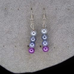 This is a purple and cream beaded earrings length 29mm width 8mm 1
