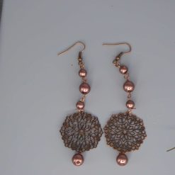 copper dangle earrings with pearl beads and a filigree floret medallion length 79 mm Width 28 mm