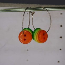 silver-plated hoop earrings with multiple acrylic buttons. 28 mm