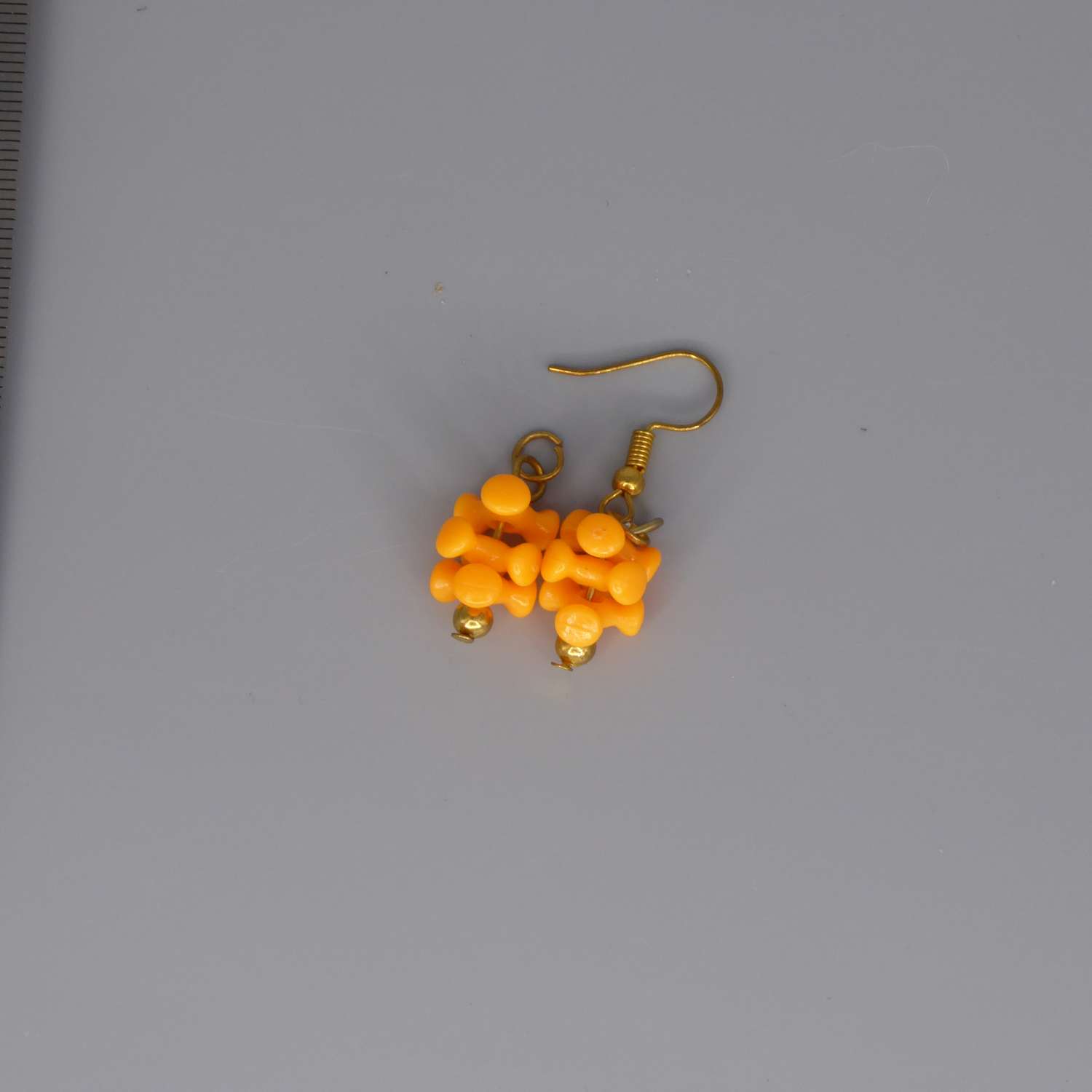 orange tri bead dangle earrings length 23mm width 10mm orange tri bead dangle earrings length 23mm width 10mm