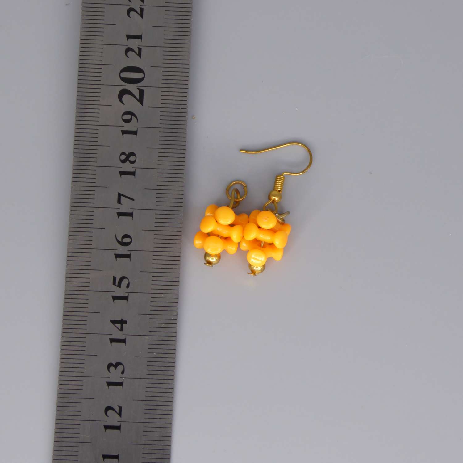 orange tri bead dangle earrings length 23mm width 10mm orange tri bead dangle earrings length 23mm width 10mm