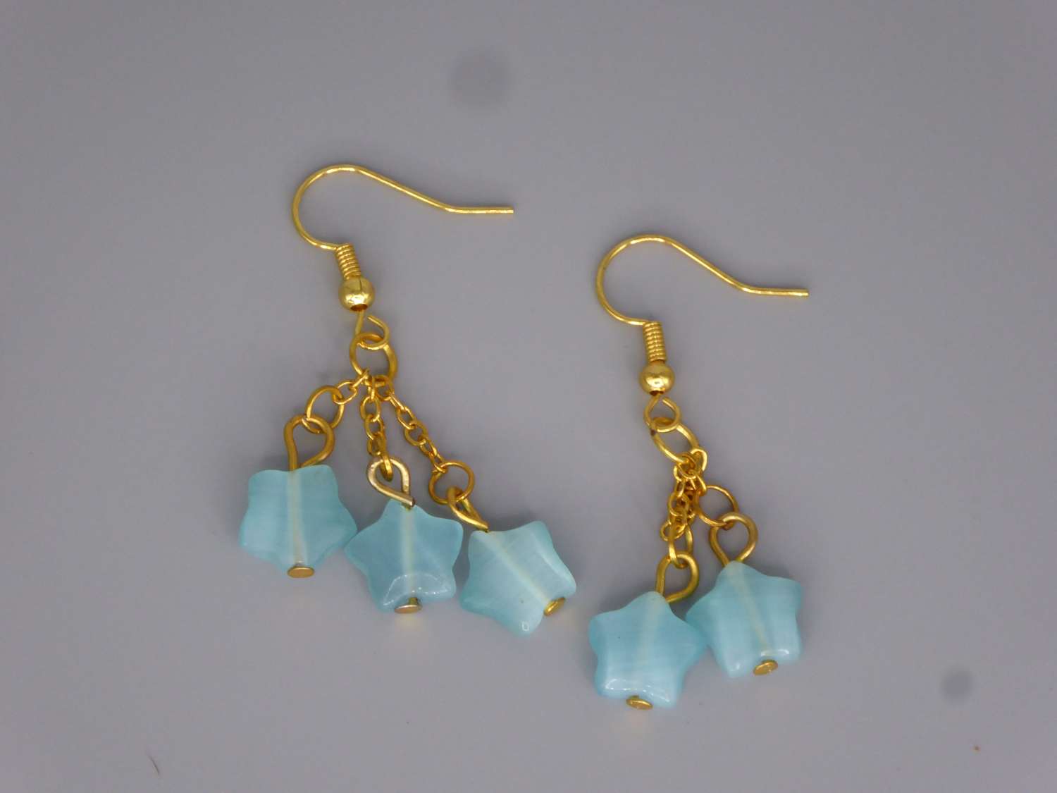 blue star dangle earrings length 29mm width 29mm blue star dangle earrings length 29mm width 29mm