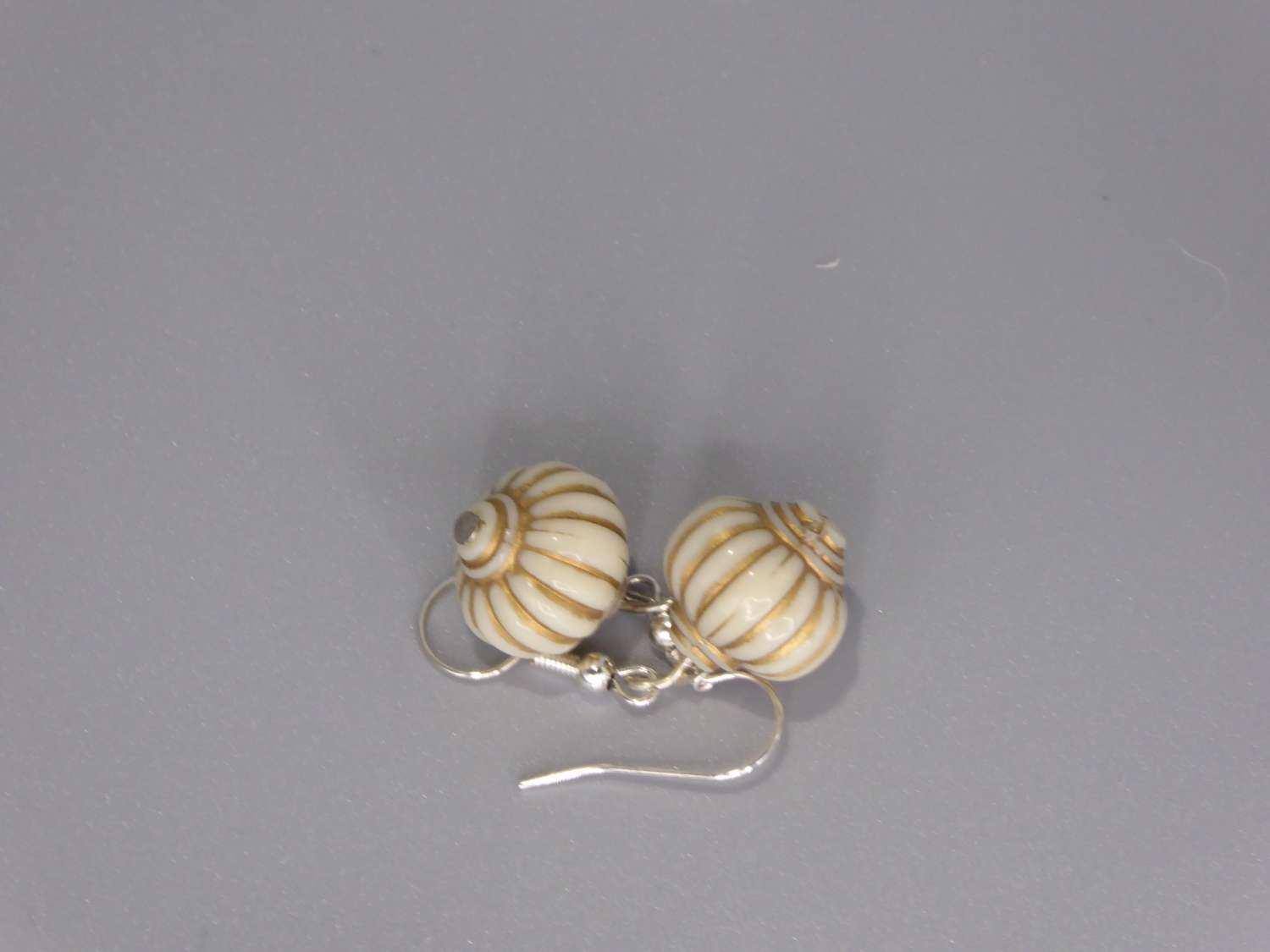 cream and gold lantern-style drop earrings. length 17mm width 13mm cream and gold lantern-style drop earrings. length 17mm width 13mm