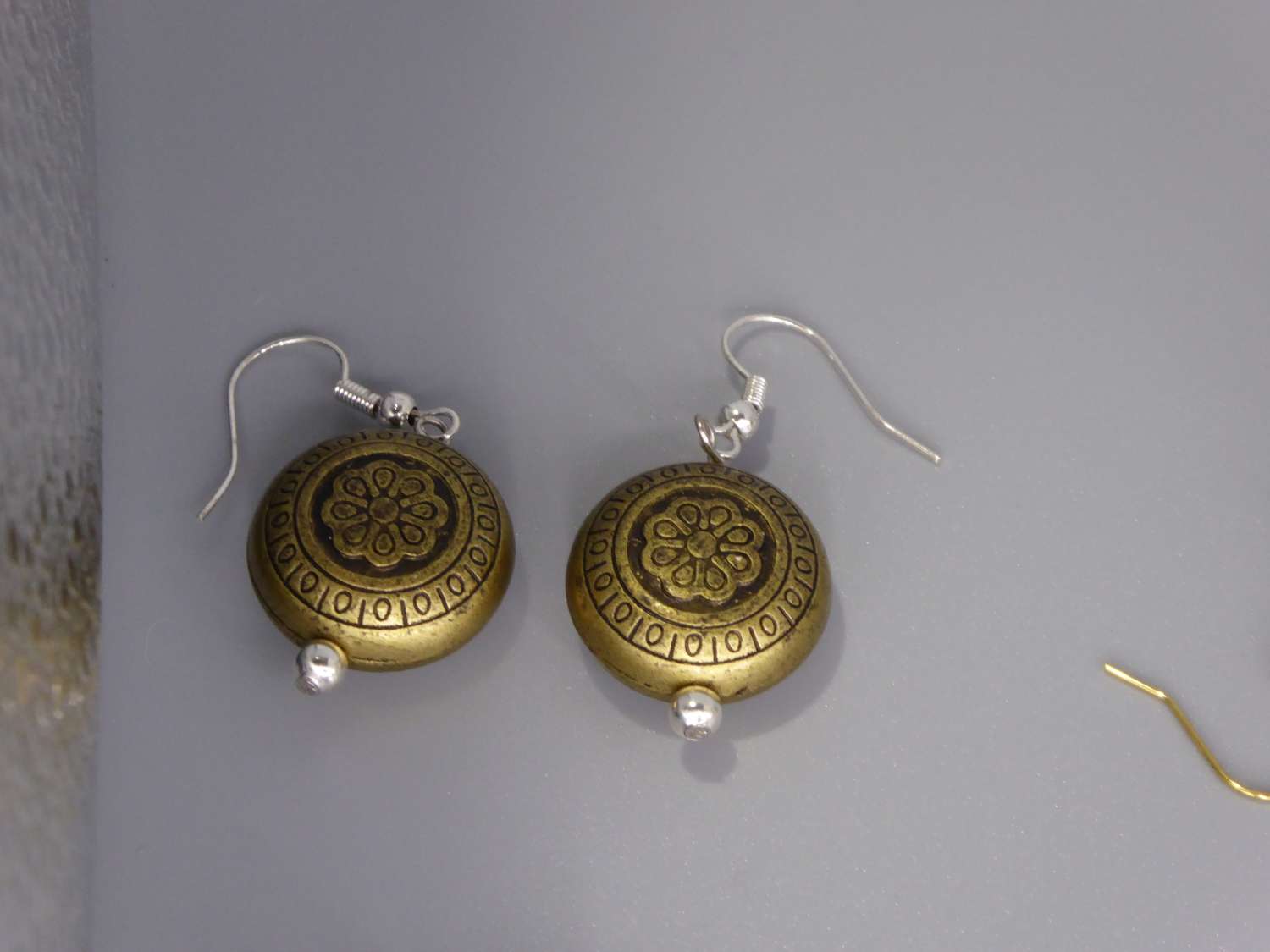 tribal yellow gold-plated earrings . length 19mm width 19mm tribal yellow gold-plated earrings . length 19mm width 19mm