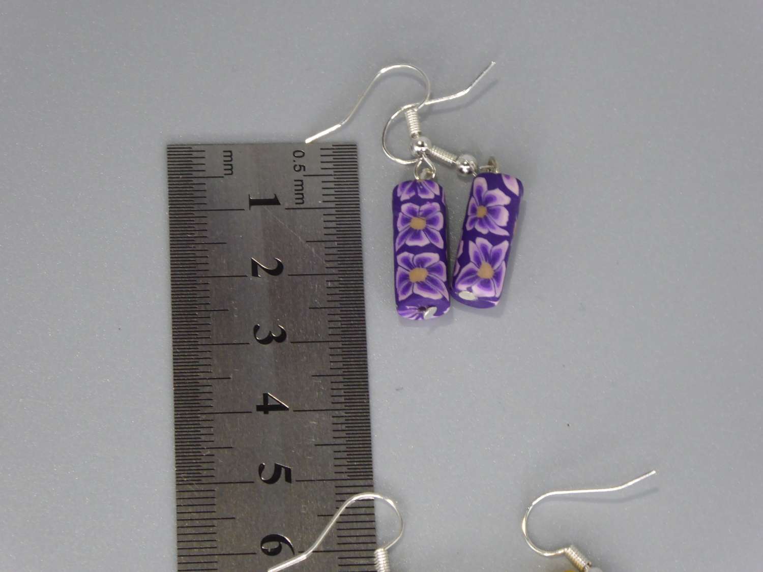 Purple Polymer Clay Beaded earrings . length 24mm width 7mm Purple Polymer Clay Beaded earrings . length 24mm width 7mm