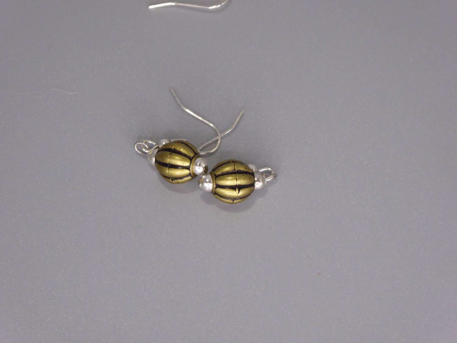 gold beaded earrings. length 16mm width 9mm gold beaded earrings. length 16mm width 9mm