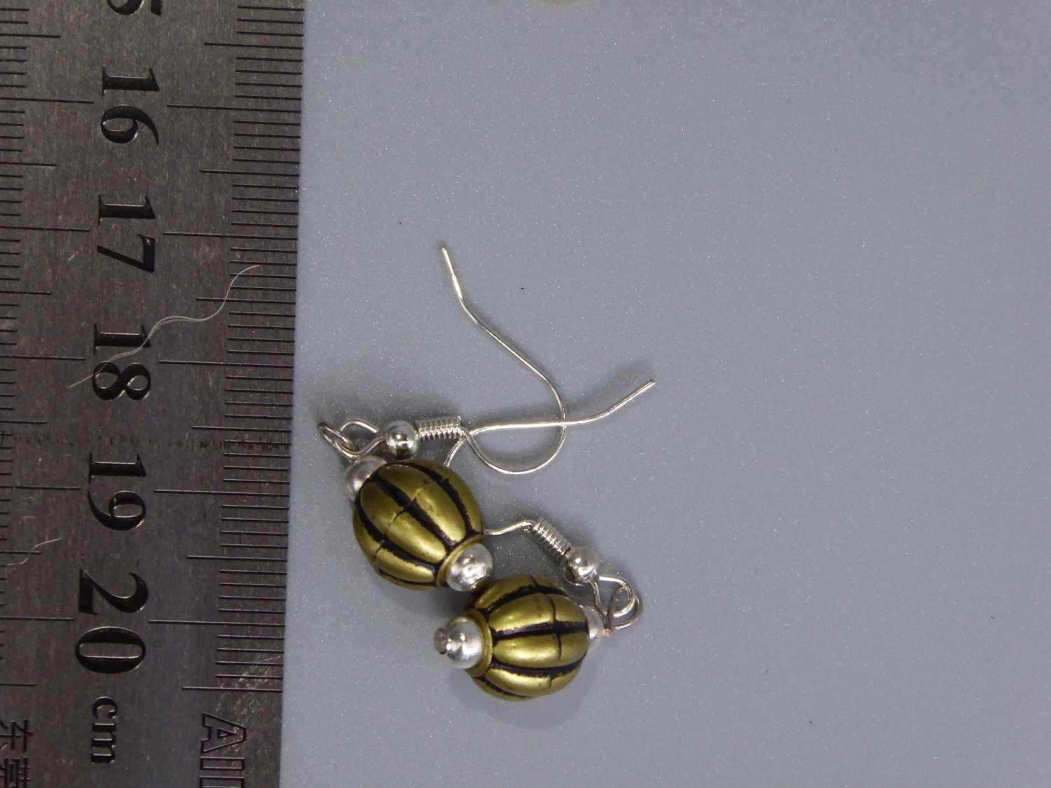 gold beaded earrings. length 16mm width 9mm gold beaded earrings. length 16mm width 9mm