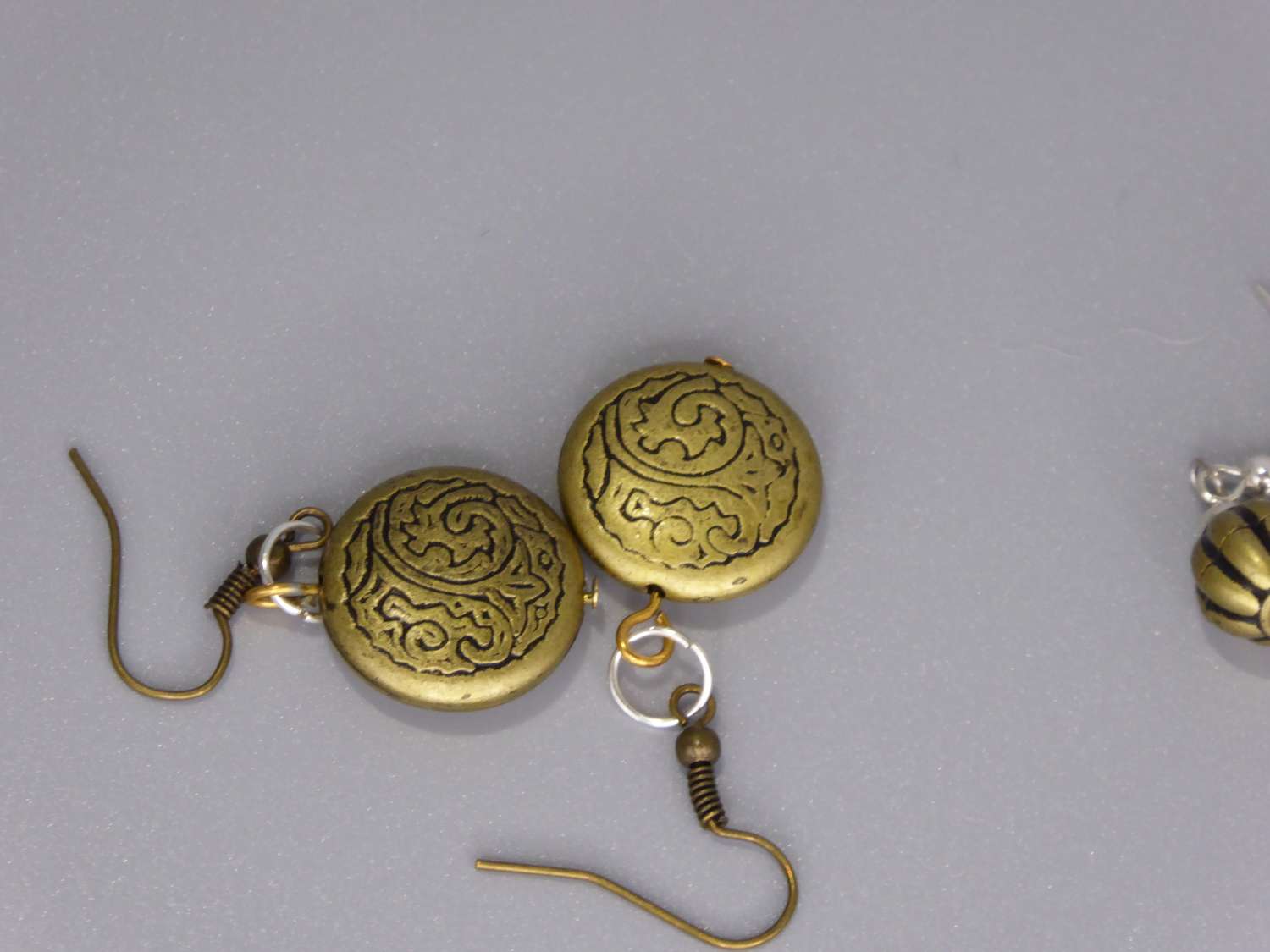 tribal yellow gold-plated earrings . length 19mm width 19mm tribal yellow gold-plated earrings . length 19mm width 19mm