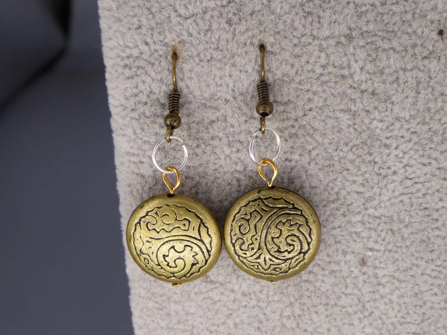 tribal yellow gold-plated earrings . length 19mm width 19mm tribal yellow gold-plated earrings . length 19mm width 19mm