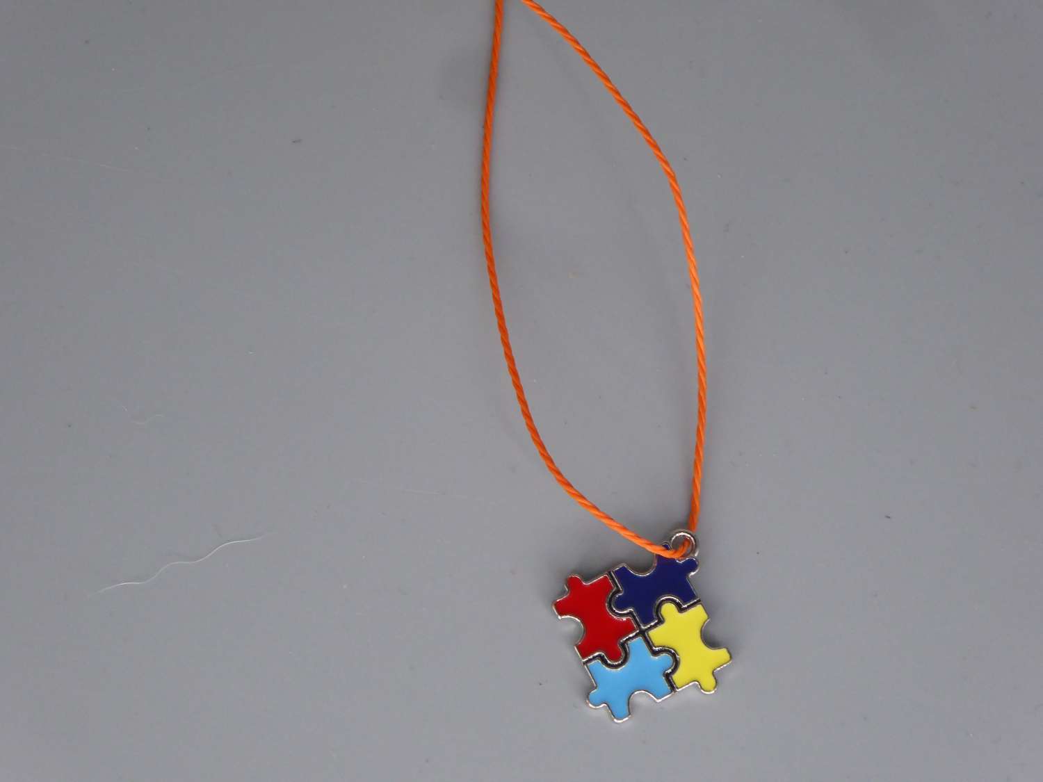 Boho orange Corded Necklace Autism Awareness Necklace 44cm pendant size is 18mm Boho orange Corded Necklace Autism Awareness Necklace 44cm pendant size is 18mm