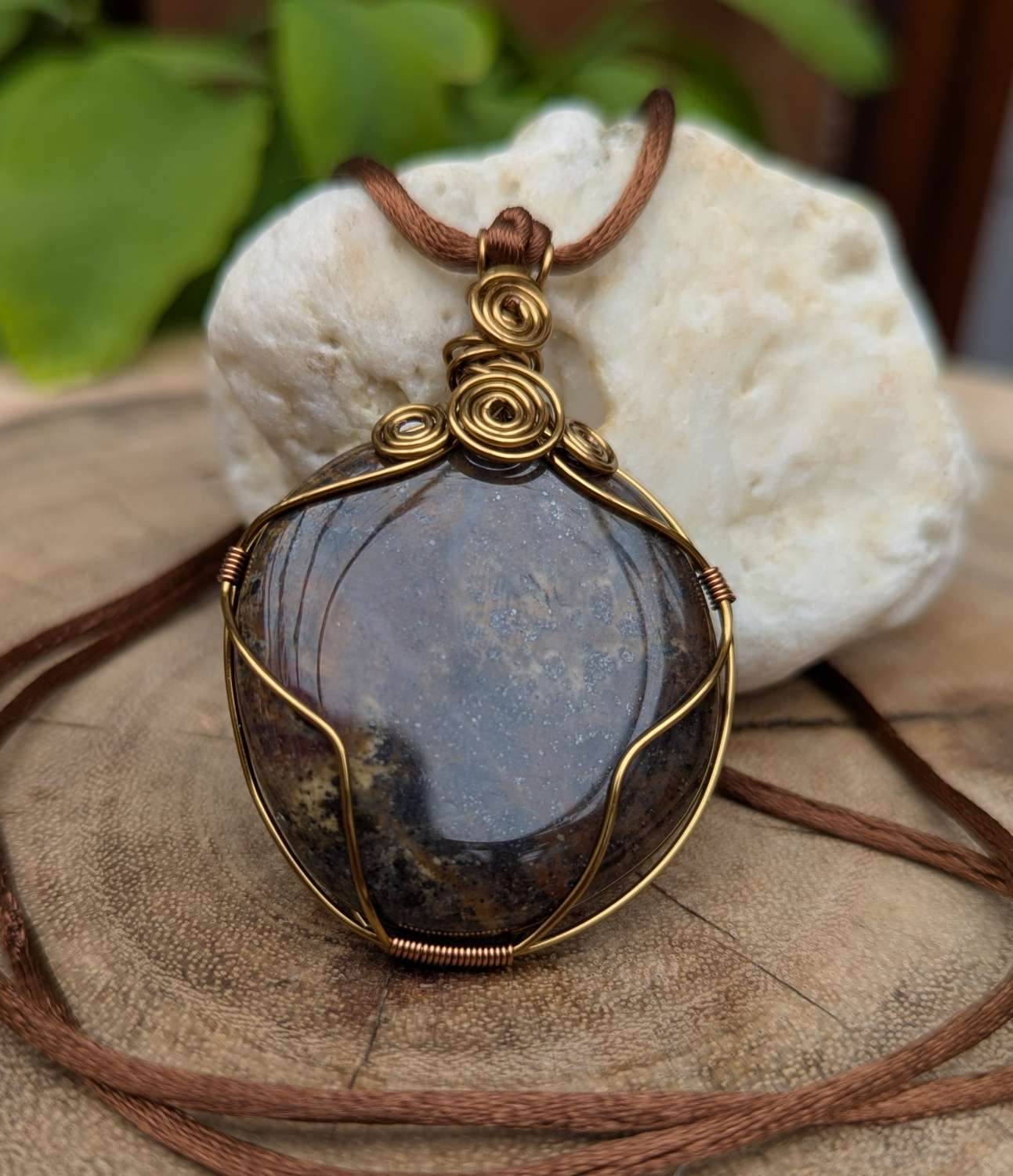 Wire wrapped pendant - fossilised dinosaur bone Wire wrapped pendant - fossilised dinosaur bone