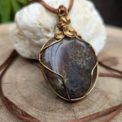 Wire wrapped pendant - fossilised dinosaur bone 1 Wire wrapped pendant - fossilised dinosaur bone 1