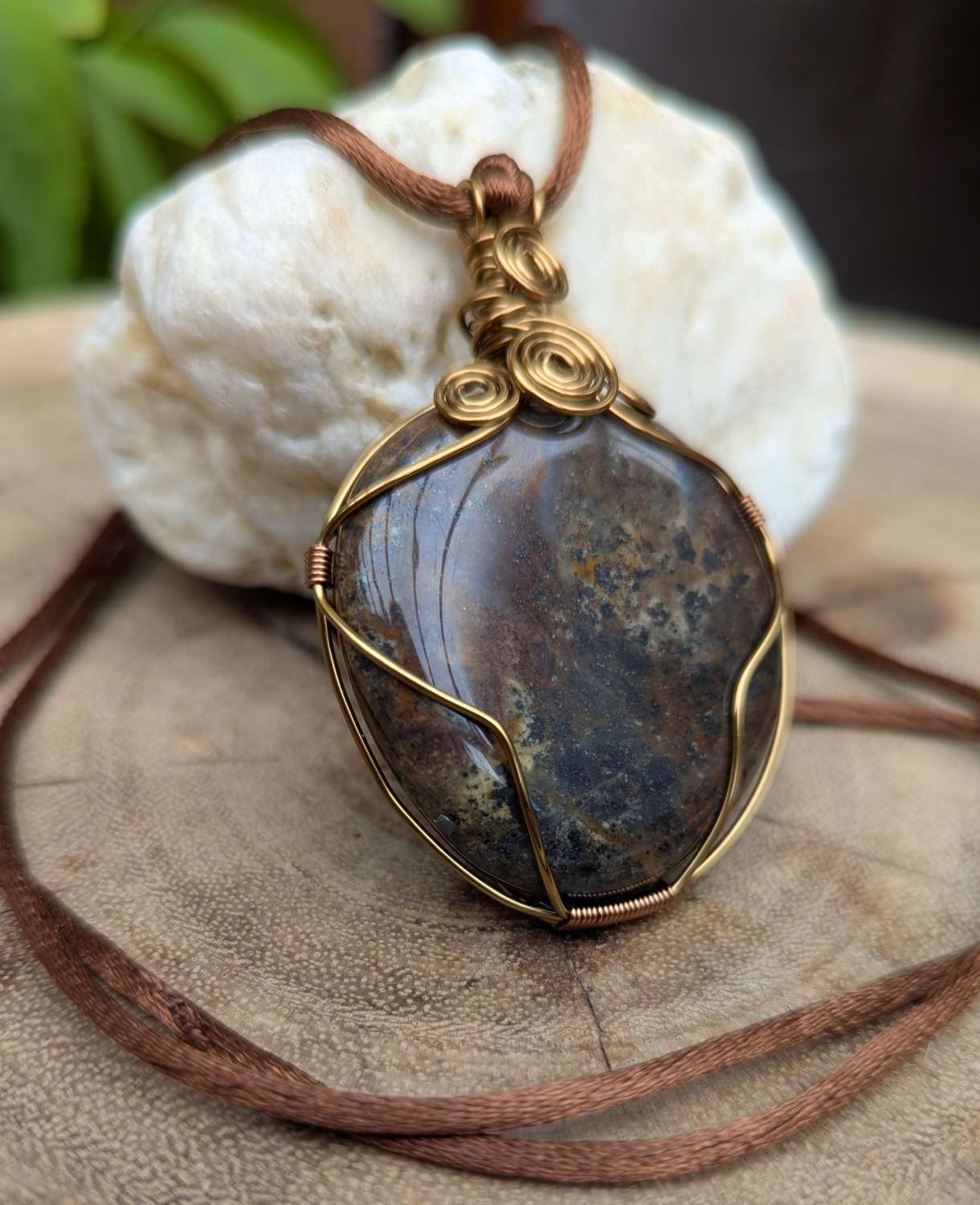 Wire wrapped pendant - fossilised dinosaur bone Wire wrapped pendant - fossilised dinosaur bone