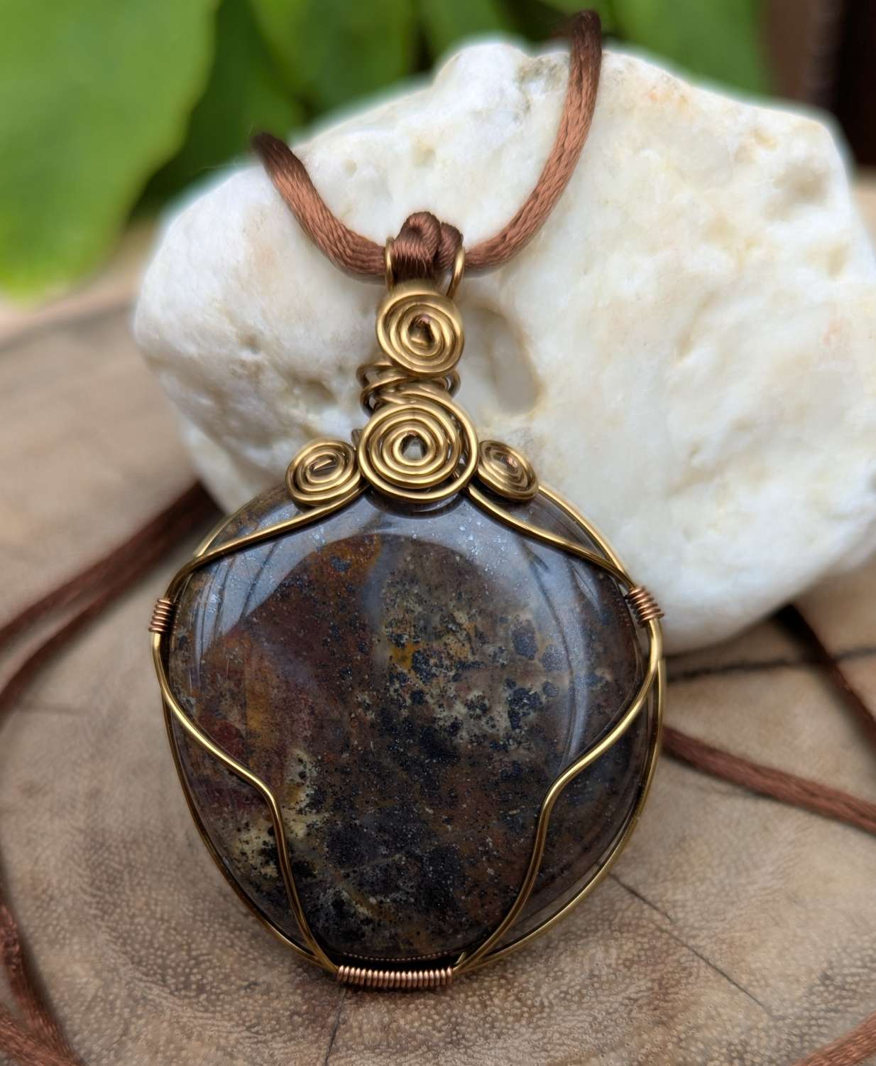 Wire wrapped pendant - fossilised dinosaur bone Wire wrapped pendant - fossilised dinosaur bone