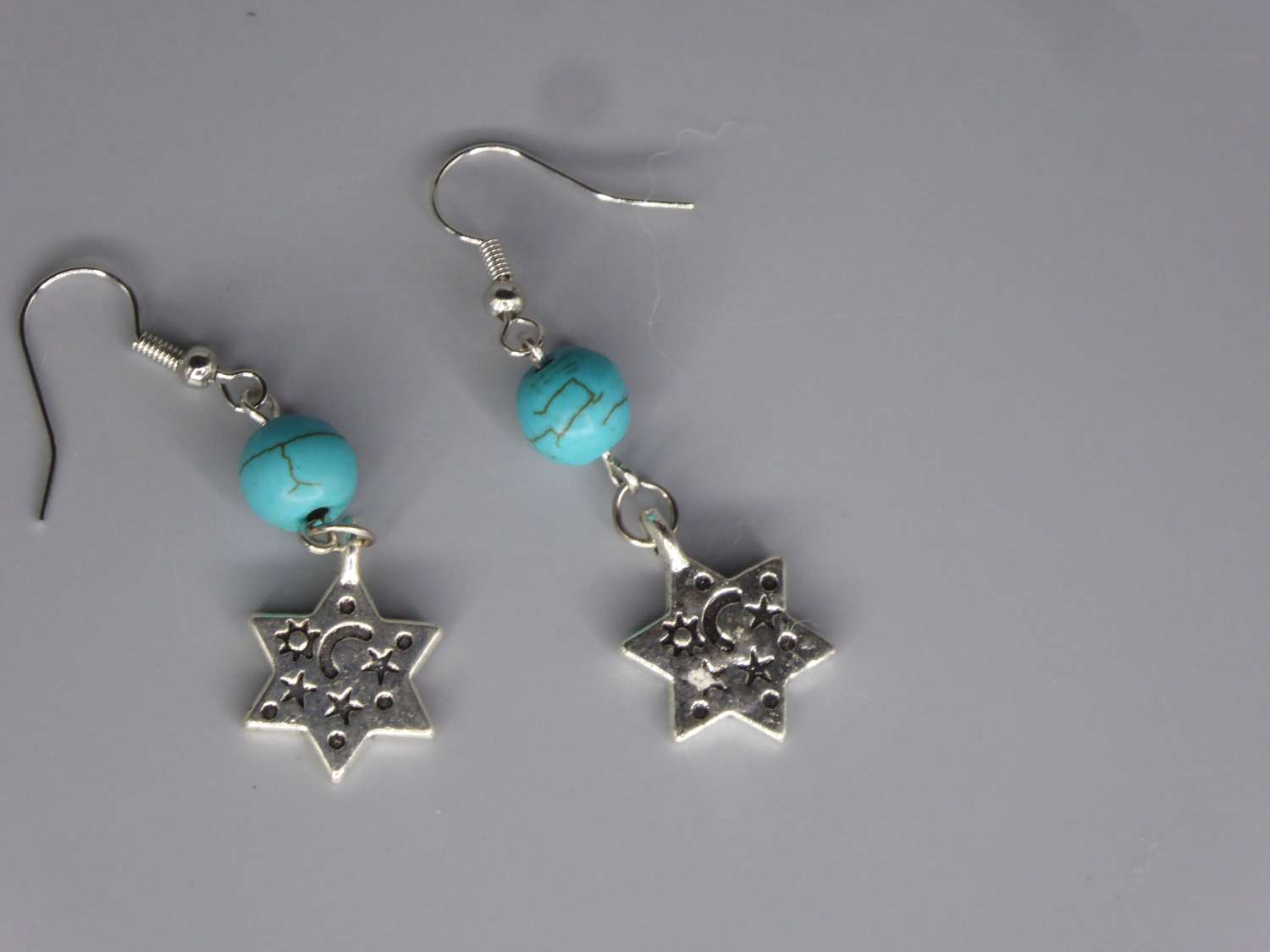 Celestial Dangle with Turquoise Colored Bead earrings length 37mm width 12mm Celestial Dangle with Turquoise Colored Bead earrings length 37mm width 12mm