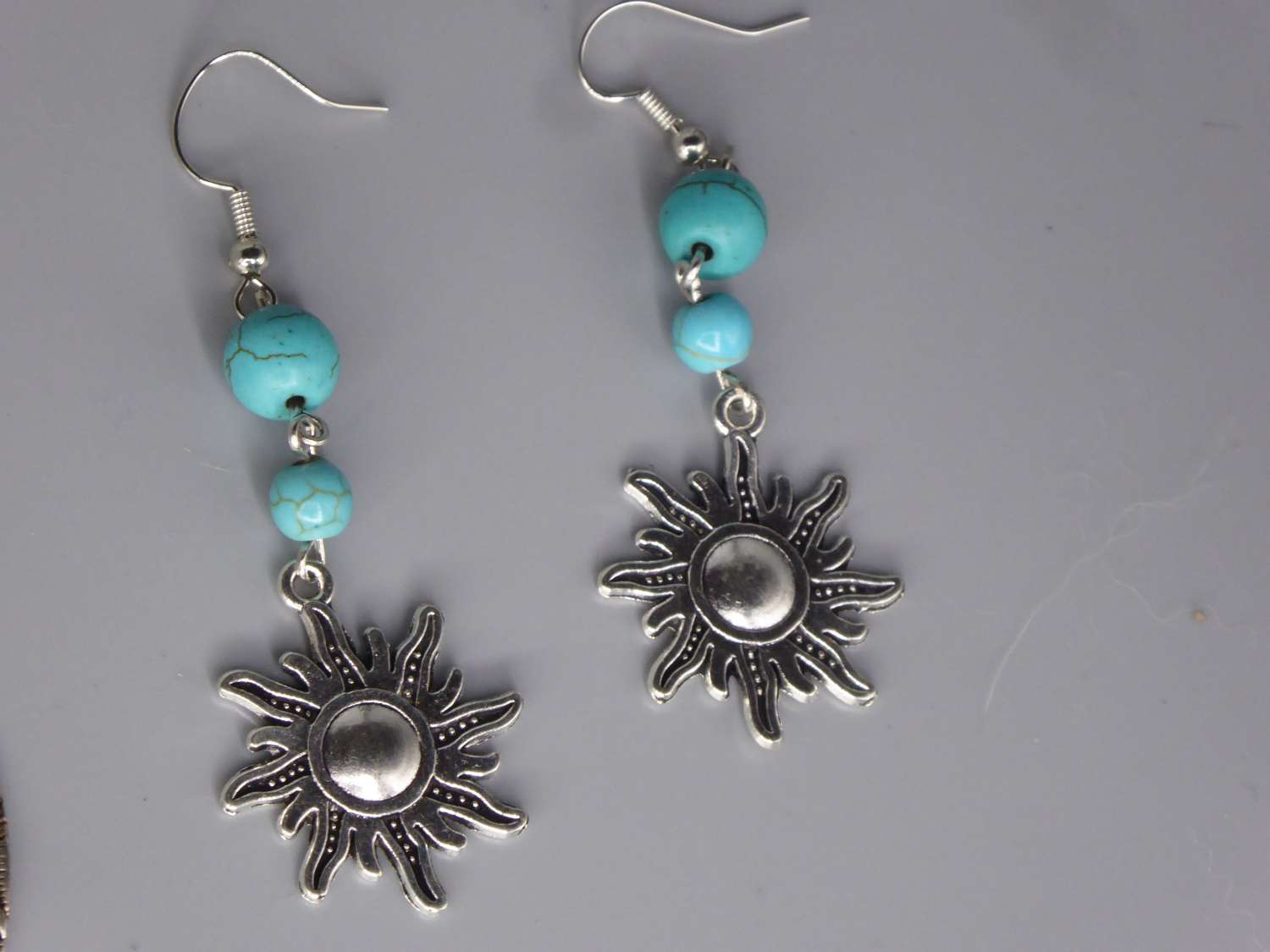 Celestial Dangle with Turquoise Colored Bead earrings length 64mm width 24m Celestial Dangle with Turquoise Colored Bead earrings length 64mm width 24m