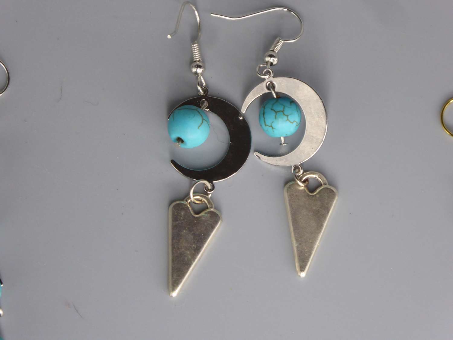 Celestial Dangle with Turquoise Colored Bead earrings length 42mm width 18mm Celestial Dangle with Turquoise Colored Bead earrings length 42mm width 18mm