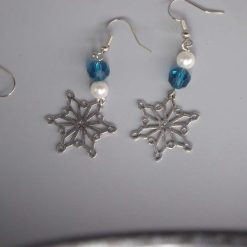 silver snowflake dangle earrings with white beads length 60 mm width 21 mm