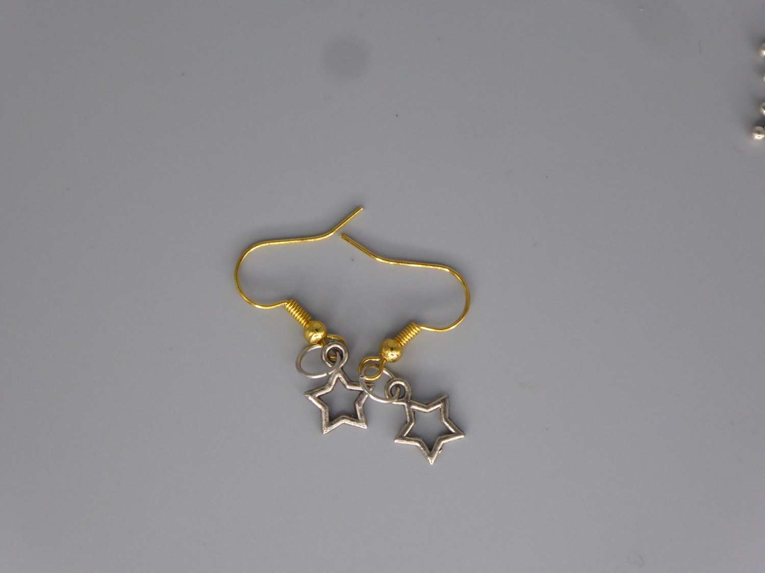 silver star dangle earrings with white beads length 9 mm width 9 mm silver star dangle earrings with white beads length 9 mm width 9 mm