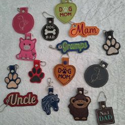 BAG TAGS - KEY CHAINS - LOTS OF ASSORTED DESIGNS