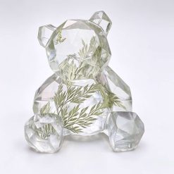 Beautiful Teddy Bear with real fern